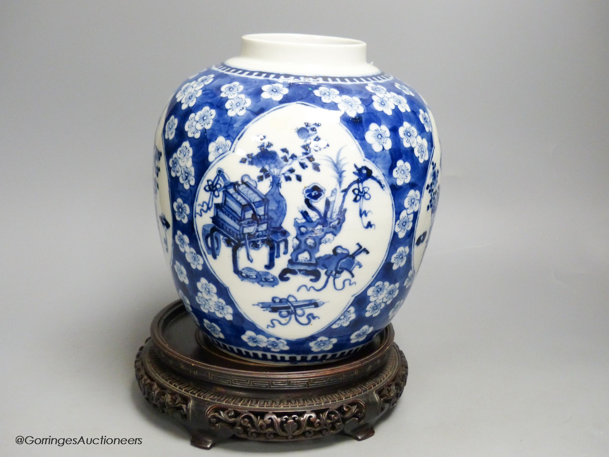 A Chinese blue and white 'Hundred Antiques' jar, Kangxi mark, c.1900